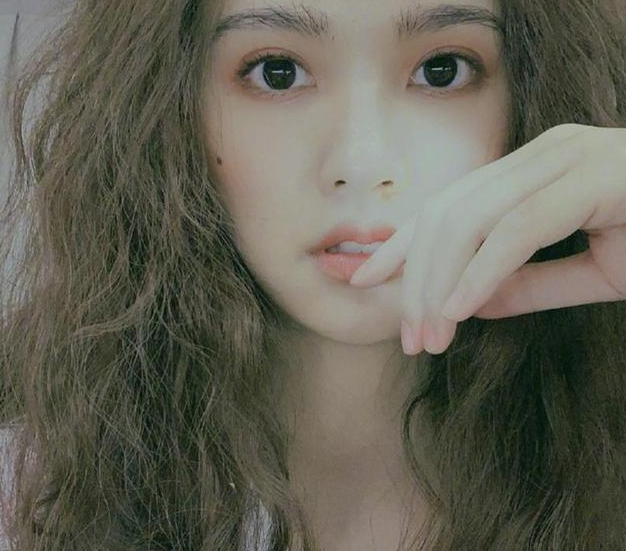 杨丞琳换新发型,大胆挑战羊毛卷造型,这发量我酸了