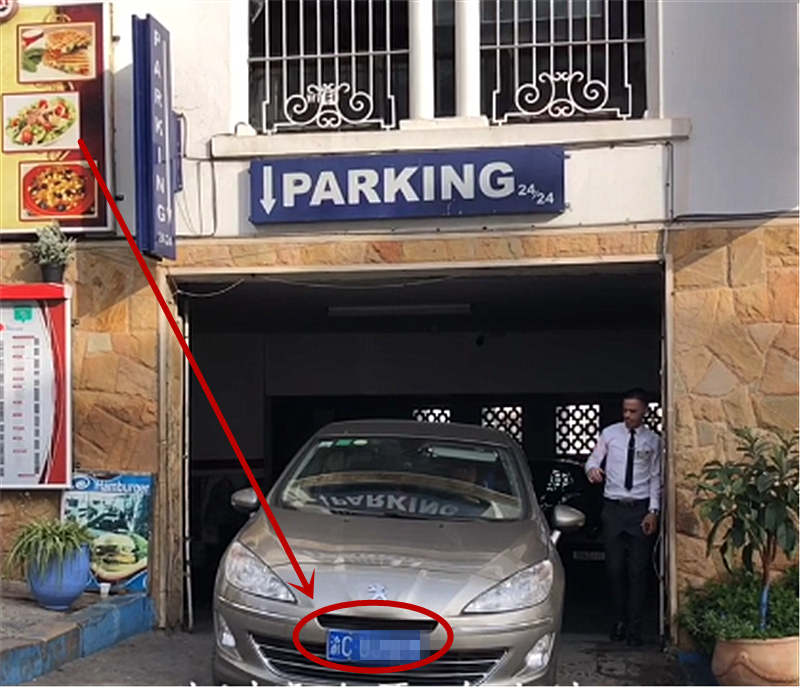 蓝牌标致408现摩洛哥,挂"渝c"牌,停车3小时20元