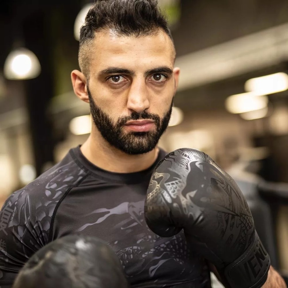 乔治佩托西奥从战乱饥饿与贫穷中走出的格斗冠军