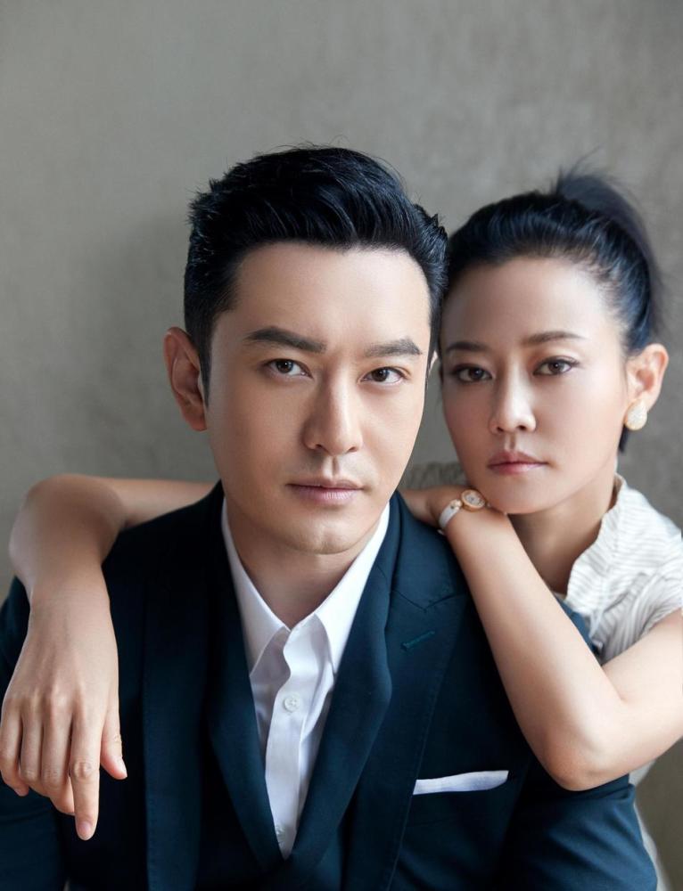 明星图集黄晓明与谭卓出席活动两人气场逼人