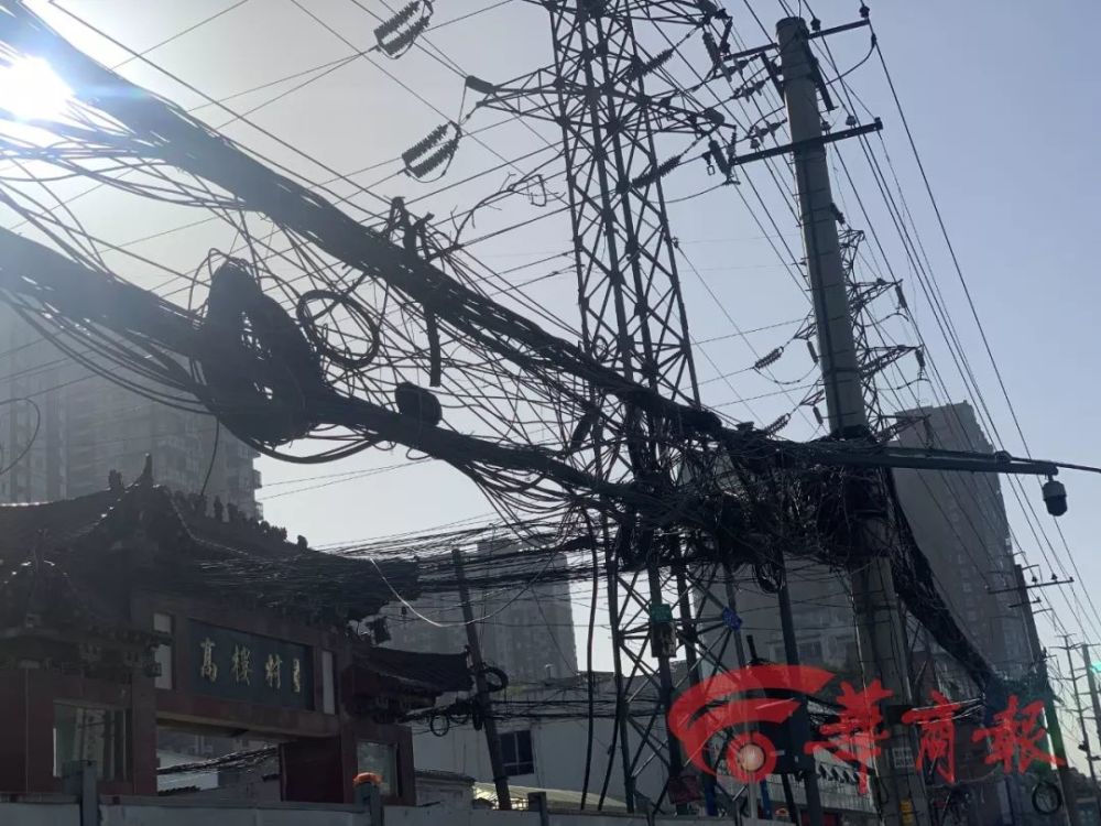 西安架空线缆落地进行时 看看相关部门怎么做 腾讯新闻