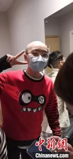 宁波援鄂护士变 光头 头发长了 带家人再来武汉 腾讯新闻
