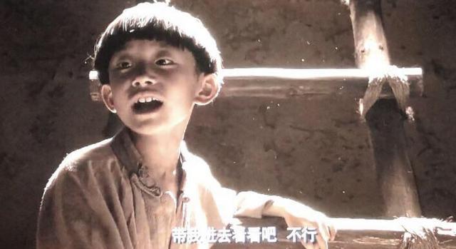 《铁梨花》的少年张吉安,一顶小锅盖头,两个露出的小板牙,那时候的