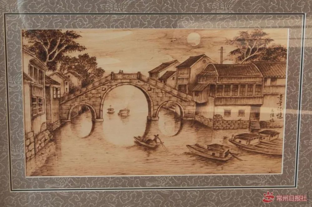 代表性传承人张国良,在进行烙画主题创作时多以志愿者为人物画聚焦点