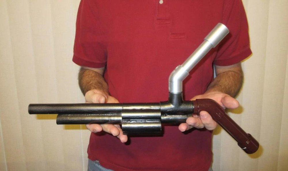 你管这些玩意叫枪盘点国外自制的奇葩武器21公斤的霰弹枪见过吗