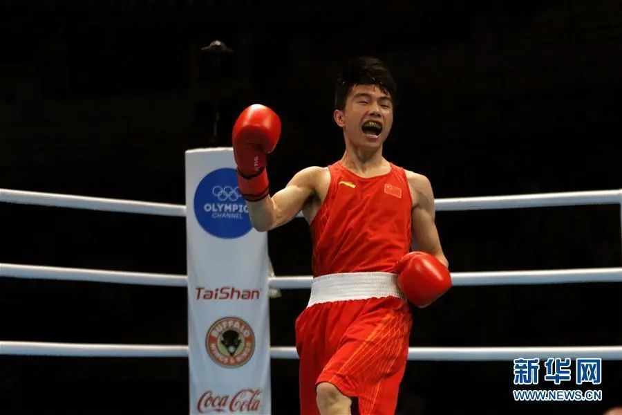奥运会拳击资格赛男子4852公斤级中国选手胡建关夺冠
