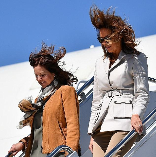 大风吹起裙摆头发狂乱没法看,糗大了