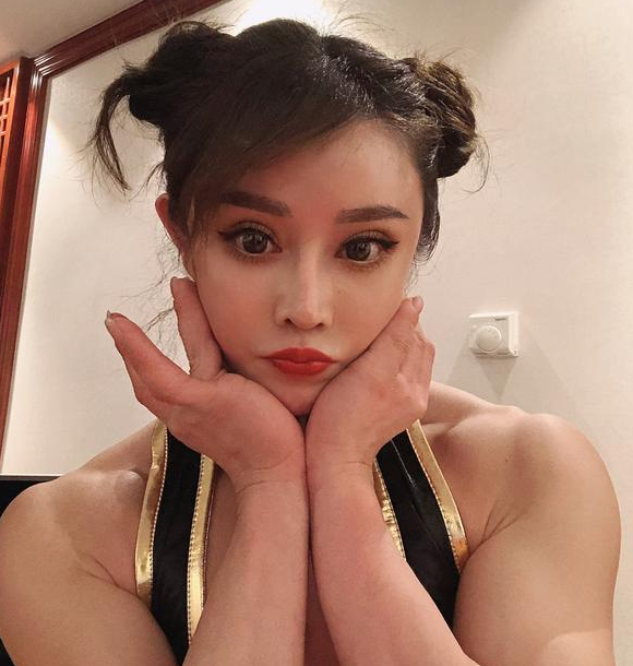 这位山东妹子,练出一身健美肌肉,被称为"真人版春丽"