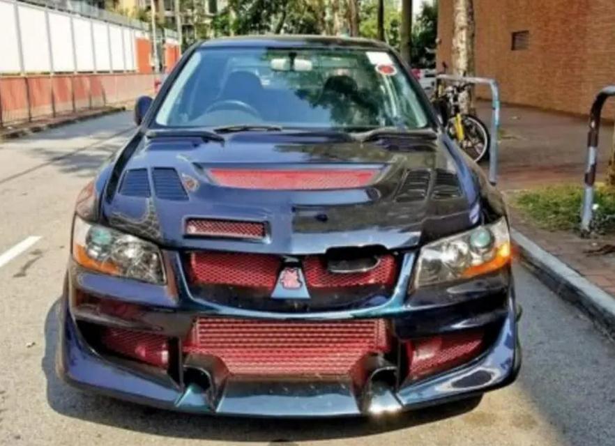 限量50台的成龙版evo,当年售价60万,13年后价值几何?_腾讯新闻