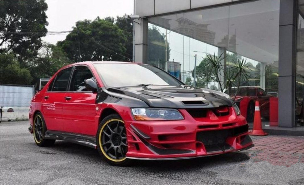 限量50台的成龙版evo,当年售价60万,13年后价值几何?_腾讯新闻