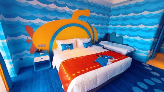 那就是 云南 抚仙湖 海豚湾 酒店!卡通房间,在这里睡觉就像在云朵里