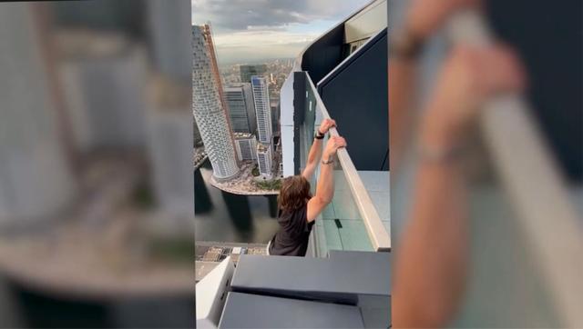 英国男子艺高人胆大完全没有保护装置从182米高天台上跳下