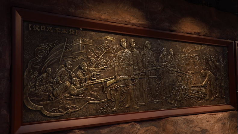 胡伟业用六块浮雕串联起了中国革命的历史,组成了一个可以触摸红色