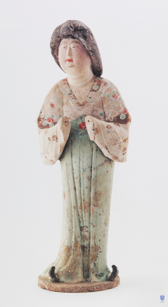 唐陕西或河南彩绘陶仕女俑玫茵堂藏我们看到上图玫茵堂藏的这件仕女俑