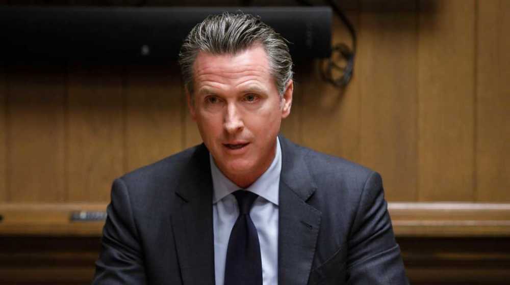 新冠病毒|新冠病例激增，美国多州暂停重新开放，恢复防疫限制措施