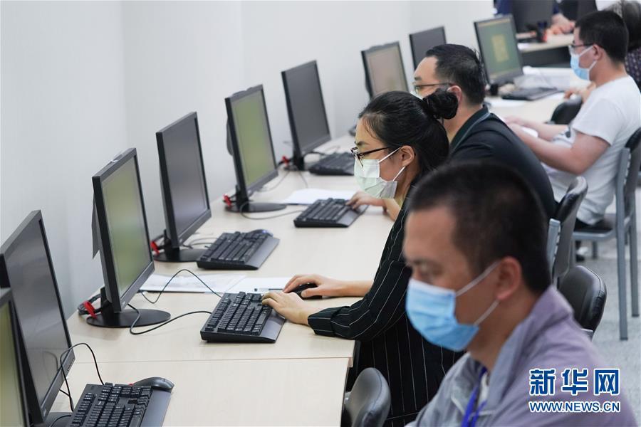 高考|今年高考是如何评卷的——走进北京高考评卷点