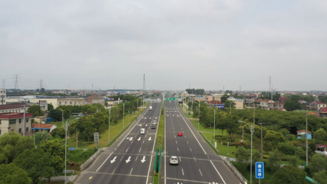 改造完成后全程无红绿灯,骑岸高速出口至通州湾示范区行驶时间由40