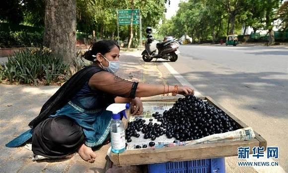 印度_社会|确诊病例逾百万，但印度缘何不“自悲”？