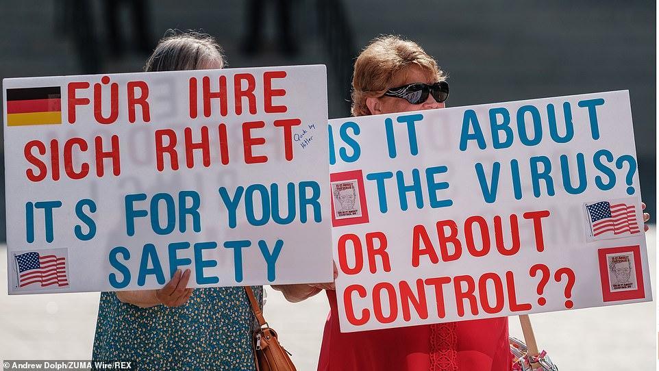 美国_社会|美国数百反口罩人士集结抗议，称“不会戴上别人的恐惧”，武装民兵护航