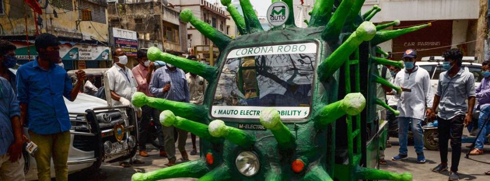 新冠病毒|印度新冠患者租三轮车去医院途中去世，被扔在马路中间无人照看