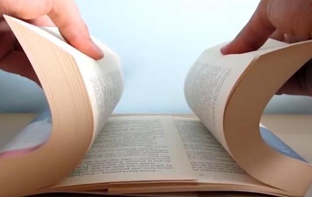 把两本书重叠在一起,一辆坦克都拉不开,这是什么原理