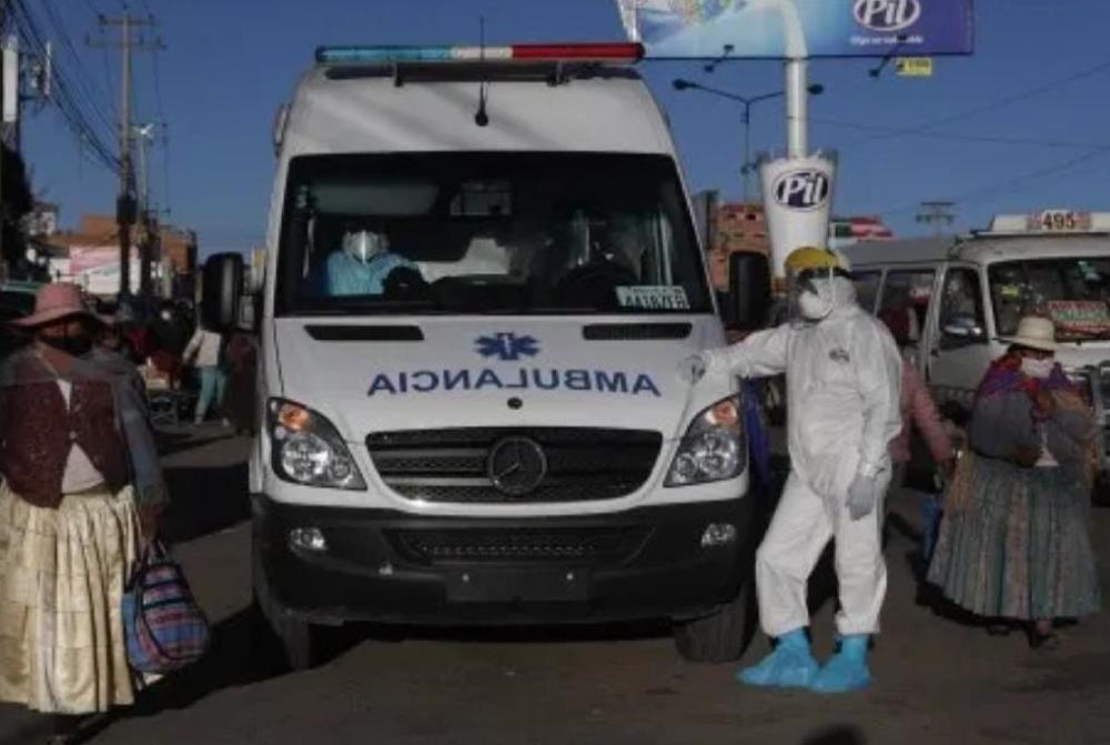 玻利维亚_社会|玻利维亚警察街头处理数百具尸体，均是因新冠丧生的人们