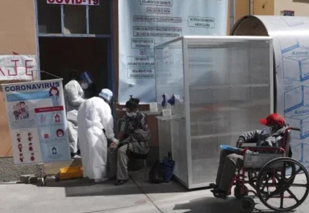 玻利维亚_社会|玻利维亚警察街头处理数百具尸体，均是因新冠丧生的人们