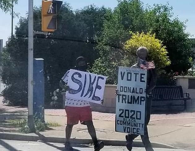 美国_时政|美国黑人男子大白天被人枪杀，死前曾手持标语：为特朗普投票