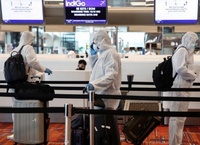 检疫手段还是侵犯隐私 新加坡出台新政 入境游客需佩戴电子腕带 腾讯新闻