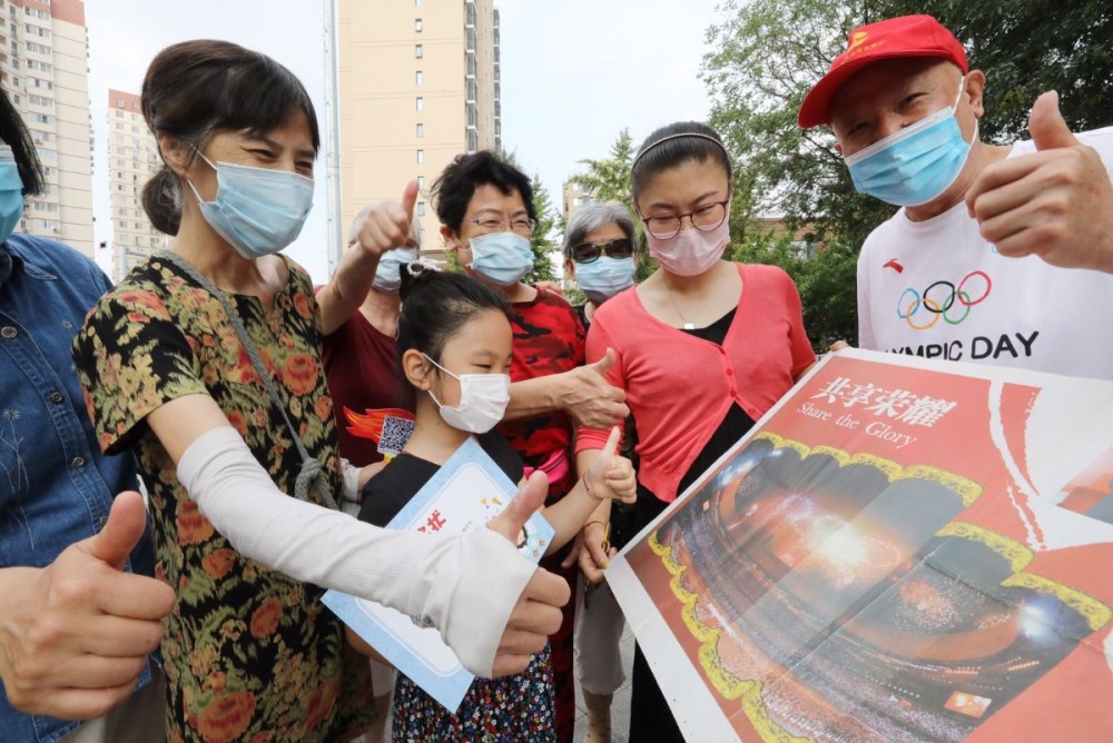 奥运村|“我和奥运有个约会”！启动仪式上他拿出了12年前的《北京日报》