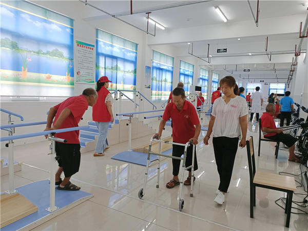 残疾人集中托养中心就建在三门闸医院院内,目前已入住20名重度残疾人