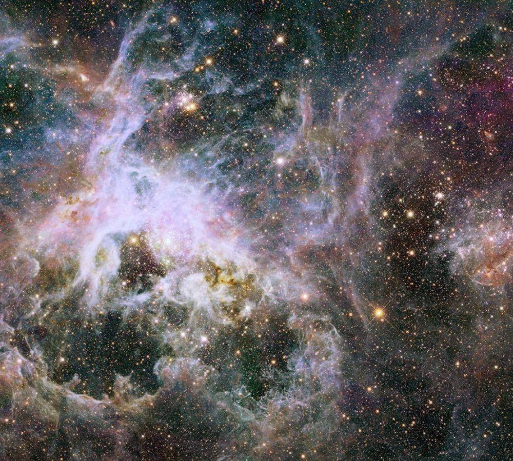 类星体|遥远的“类星体海啸”正在撕裂自己的星系