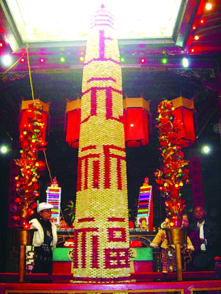 甘蔗|甘蔗切成蔗节，搭叠成空心灯塔，堪称“中华一绝”