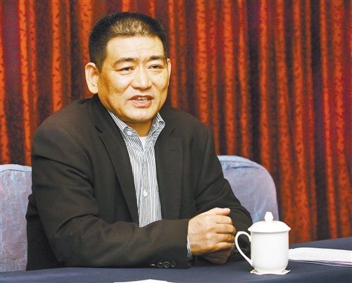 涂建华是怎么从一个煤矿电工变成身家百亿的富商的