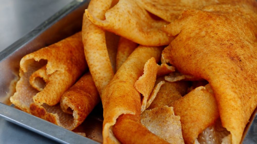 给云南人一张猪皮还你一桌满汉全席