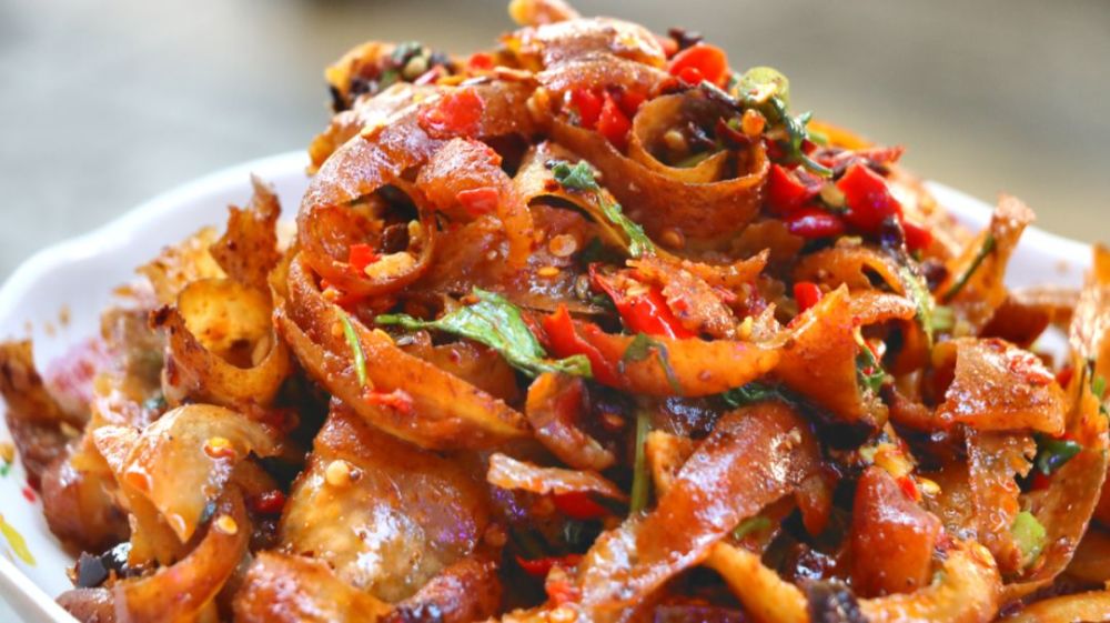 给云南人一张猪皮还你一桌满汉全席