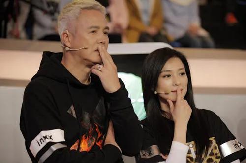 张庭|张庭夫妇斥巨资买上海整栋楼：被骂18年，她却活成百亿阔太？