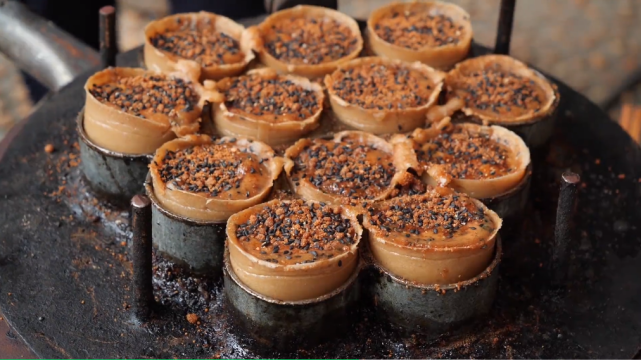 忻城特色小吃—大家福,人称"蜂窝煤",你吃过吗?|卢金贵|黑豆|忻城|特