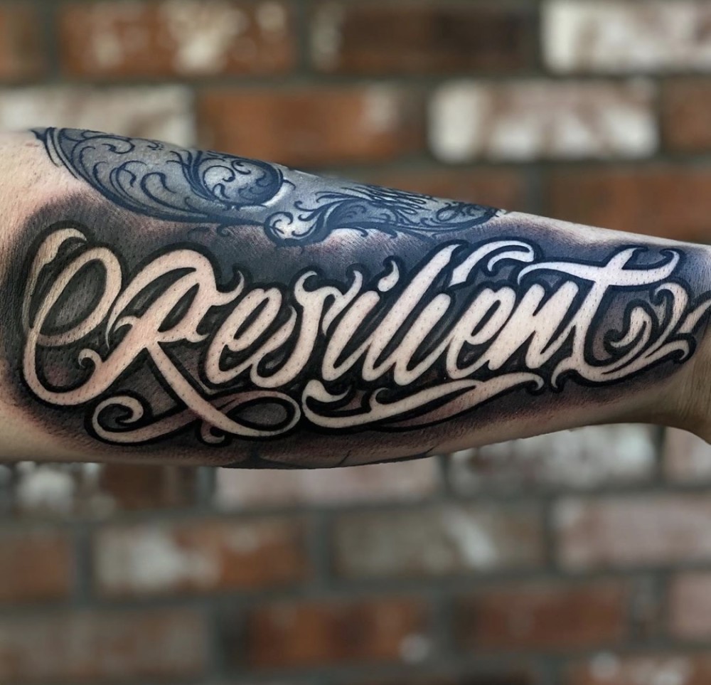 上海由龙纹身分享花体字纹身图案的小知识