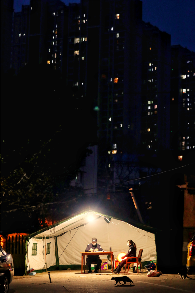 北京|奋战“疫”情中的公安铁军专题摄影展在北京展出