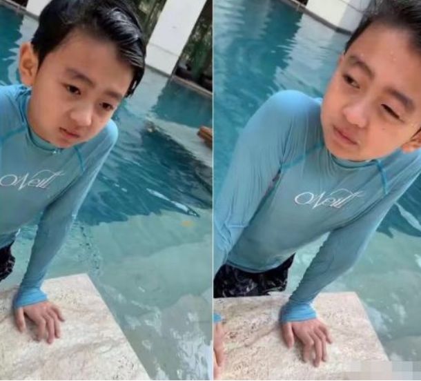 张柏芝|张柏芝三胎后挑战“露脐装”！故意撩开外套秀腹肌，不敢相信她39岁了！