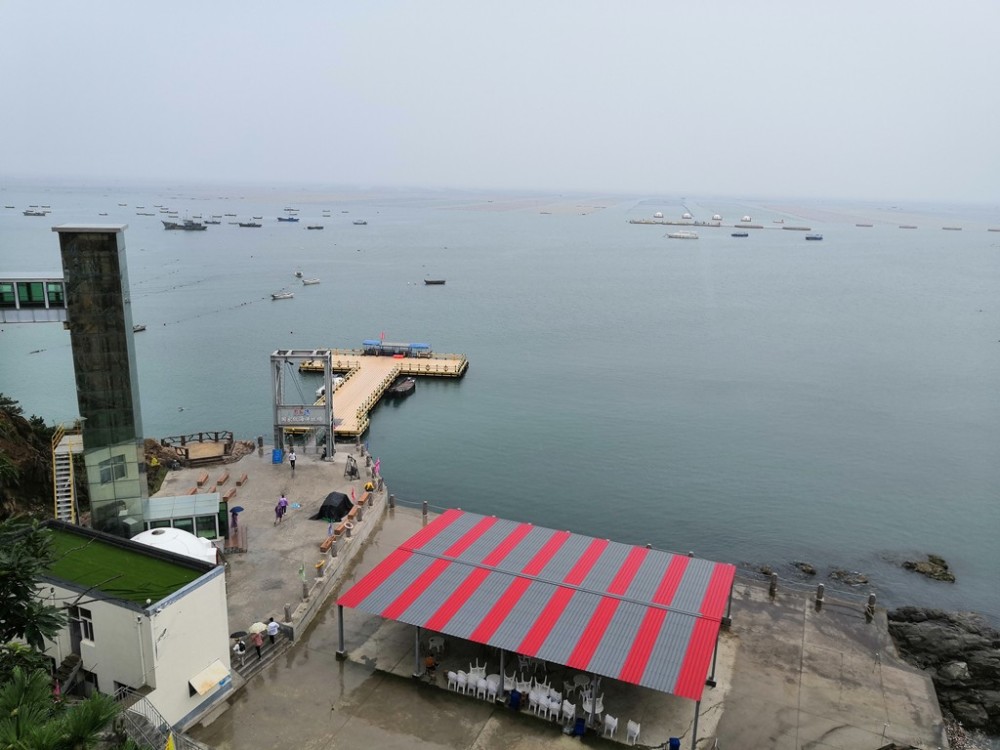 威海爱伦湾海洋牧场游玩感受:冒着小雨逛了半天,好看好玩还不错_腾讯