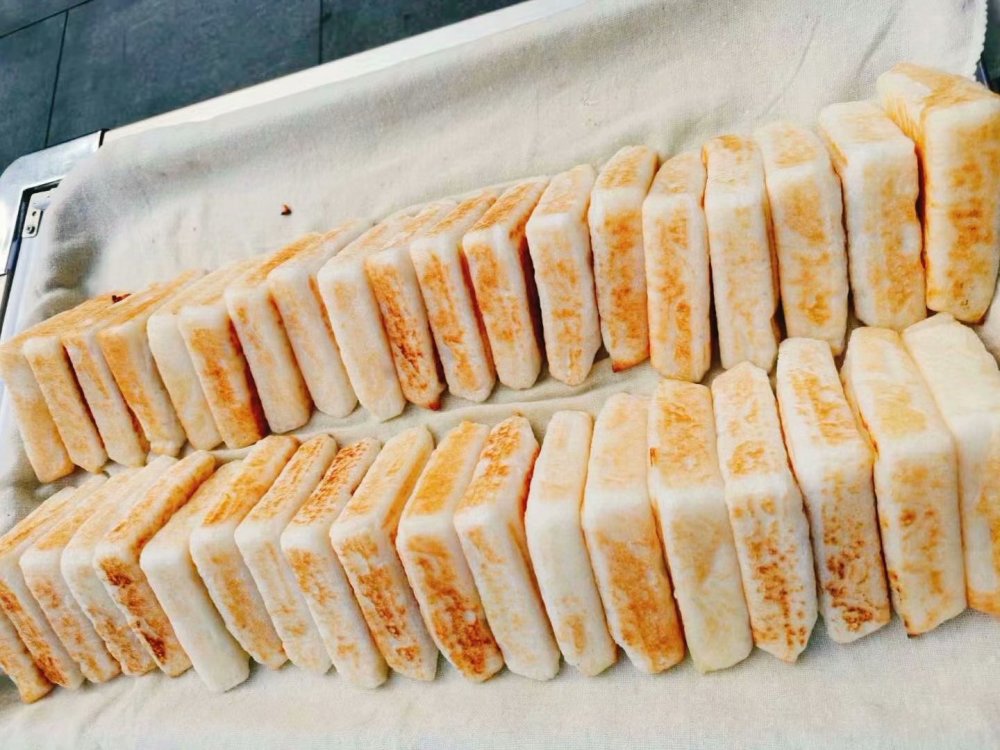 外地游客"飞"到重庆疯狂吃肖战同款三角粑_腾讯新闻