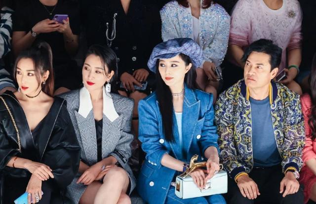 范冰冰|范冰冰和母亲亮相机场，绿衣绿帽造型太吸睛，却被网友提醒收肚子