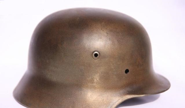 重新组建的那段时间,依然使用了m1917钢盔作为阅兵和普通军事头盔使用