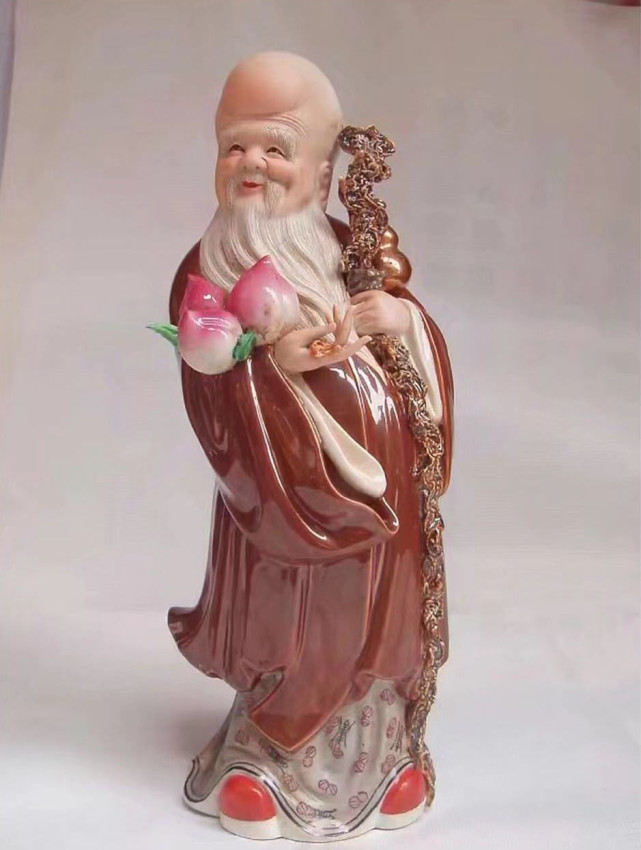 古雅轩文化传媒推荐高温紫金釉重彩寿星翁立像赏析