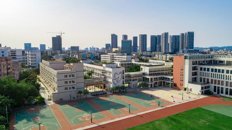 深圳光明小学校史回眸六十余载风雨路几经迁改谱华章