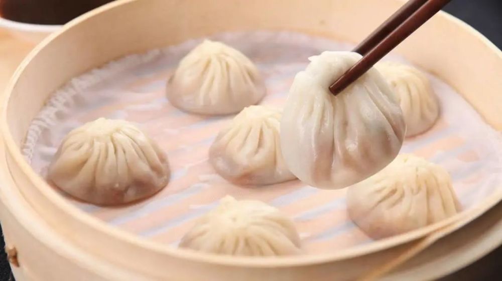 置若白菊,悬如灯笼——开封灌汤小笼包_腾讯新闻