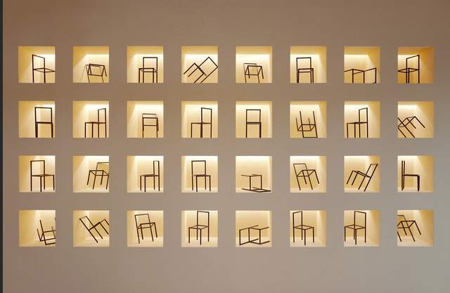 ▼墙面细节,设计了很多阵列式方形洞口并在其中摆放上憩盒的标志性小