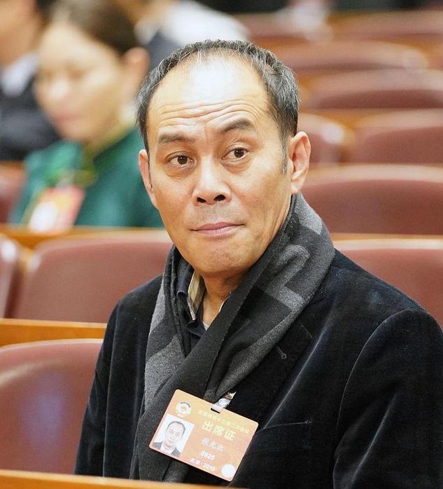 张光北娶了巩俐同学财产全部交给妻子婚后30年无绯闻